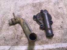 Load image into Gallery viewer, 2002 Yamaha WR250F Water pump cover coolant line