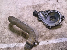 Load image into Gallery viewer, 2002 Yamaha WR250F Water pump cover coolant line