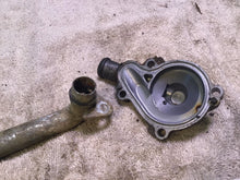 Load image into Gallery viewer, 2002 Yamaha WR250F Water pump cover coolant line