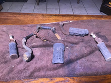 Load image into Gallery viewer, 1974 - 1977 Suzuki GT 380 GT380 foot pegs mounts passenger pegs foot peg lot