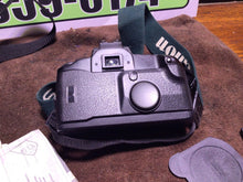 Load image into Gallery viewer, Canon EOS Elan 35mm SLR Film Camera Body w/ Quartz Date Back