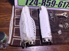 Load image into Gallery viewer, 07-22 GENUINE OEM HONDA CRF 150 R RB misc chassis hardware fork covers gas tank