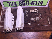 Load image into Gallery viewer, 07-22 GENUINE OEM HONDA CRF 150 R RB misc chassis hardware fork covers gas tank