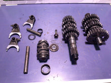 Load image into Gallery viewer, 2005 HONDA CRF450R OEM ENGINE TRANSMISSION TRANNY ASSEMBLY GEARS 23210-MEN-A00
