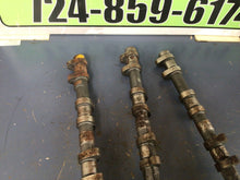 Load image into Gallery viewer, 1999 Triumph 955i Daytona Exhaust intake Camshaft Camshaft Oem needs cleaned up