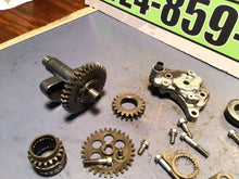 Load image into Gallery viewer, 1984 Honda XL250R right side gears oil pump counter balance gear idler secondary