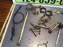 Load image into Gallery viewer, 1987 Honda XL600 R OEM misc chassis hardware bolts swing arm bolt fork clamps di