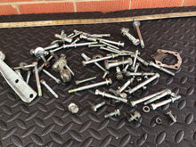 Load image into Gallery viewer, 1993 Harley Davidson Sportster 883 misc chassis and motor hardware bolts