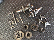 Load image into Gallery viewer, 1990 Kawasaki KX250 OEM Transmission Shaft Input Output Gears Gearbox Tranny