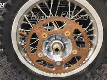 Load image into Gallery viewer, KTM65 REAR WHEEL COMPLETE 12" RIM TIRE OEM GENUINE KTM 65 SX 2003-2008
