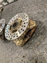 Load image into Gallery viewer, 1999 Yamaha Warrior YFM350 OEM Front Knuckles Hubs & Rotors Left & Right