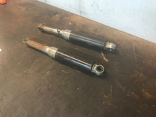 Load image into Gallery viewer, Rear shocks pulled from a 1980 Indian AMi 50cc
