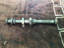Load image into Gallery viewer, 1990 HONDA CR125R CR125 rear axle rear axle spacers chain adjuster hardware
