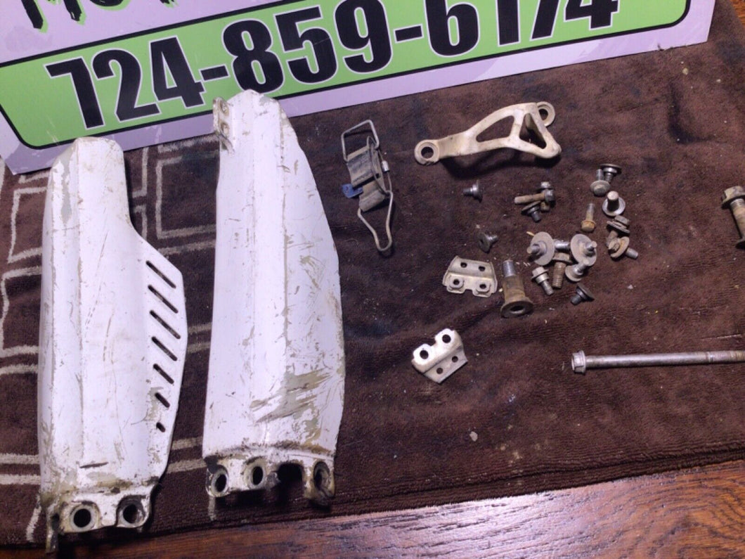 07-22 GENUINE OEM HONDA CRF 150 R RB misc chassis hardware fork covers gas tank