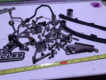 Load image into Gallery viewer, 2009 Kawasaki KLX250S KLX250 misc hardware chain guides oil line bolts clutch
