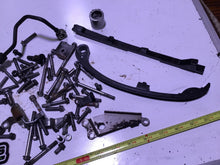 Load image into Gallery viewer, 2009 Kawasaki KLX250S KLX250 misc hardware chain guides oil line bolts clutch
