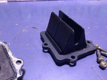 Load image into Gallery viewer, 2005 KAWASAKI KX250 2 STROKE V-FORCE  INTAKE REED BLOCK ASSEMBLY V FORCE 3
