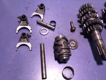 Load image into Gallery viewer, 2005 HONDA CRF450R OEM ENGINE TRANSMISSION TRANNY ASSEMBLY GEARS 23210-MEN-A00

