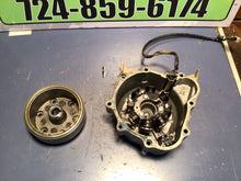 Load image into Gallery viewer, 2003 - 2005 CRF150F STATOR COVER FLYWHEEL  CASE GENUINE OEM HONDA CRF 150 F
