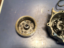 Load image into Gallery viewer, 2003 - 2005 CRF150F STATOR COVER FLYWHEEL  CASE GENUINE OEM HONDA CRF 150 F
