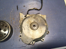 Load image into Gallery viewer, 2003 - 2005 CRF150F STATOR COVER FLYWHEEL  CASE GENUINE OEM HONDA CRF 150 F
