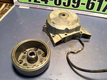 Load image into Gallery viewer, 2003 - 2005 CRF150F STATOR COVER FLYWHEEL  CASE GENUINE OEM HONDA CRF 150 F
