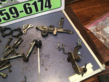 Load image into Gallery viewer, 1987 Honda XL600 R OEM misc chassis hardware bolts swing arm bolt fork clamps di
