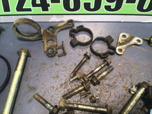 Load image into Gallery viewer, 1987 Honda XL600 R OEM misc chassis hardware bolts swing arm bolt fork clamps di
