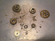 Load image into Gallery viewer, 1986 SUZUKI LT230S LT 230 S OIL PUMP ASSEMBLY HOUSING gear primary shift pawl
