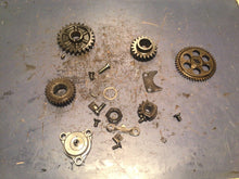 Load image into Gallery viewer, 1986 SUZUKI LT230S LT 230 S OIL PUMP ASSEMBLY HOUSING gear primary shift pawl
