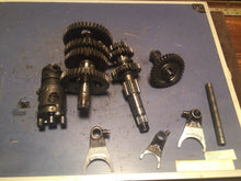 Load image into Gallery viewer, 1987-1992 Honda Trx250x Oem Transmission tranny gears shift forks
