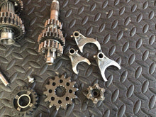 Load image into Gallery viewer, 1990 Kawasaki KX250 OEM Transmission Shaft Input Output Gears Gearbox Tranny
