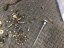 Load image into Gallery viewer, 1991 Suzuki DR350 DR 350 OEM misc chassis hardware bolts dipstick shifter bolt
