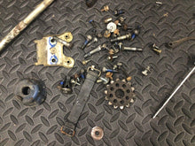 Load image into Gallery viewer, 1991 Suzuki DR350 DR 350 OEM misc chassis hardware bolts dipstick shifter bolt
