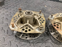 Load image into Gallery viewer, 1999 Yamaha Warrior YFM350 OEM Front Spindle Knuckles Hubs &amp; Rotors Left &amp; Right
