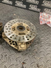 Load image into Gallery viewer, 1999 Yamaha Warrior YFM350 OEM Front Spindle Knuckles Hubs &amp; Rotors Left &amp; Right
