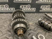 Load image into Gallery viewer, 2003 SUZUKI RM85 RM85L K3 OEM ENGINE TRANSMISSION TRANNY ASSEMBLY GEARS
