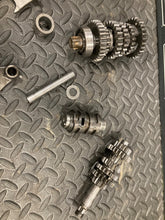 Load image into Gallery viewer, 2003 SUZUKI RM85 RM85L K3 OEM ENGINE TRANSMISSION TRANNY ASSEMBLY GEARS
