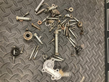 Load image into Gallery viewer, 2002-2025 Suzuki RM85 RM 85 85L misc hardware bolts water pump cover misc  OEM
