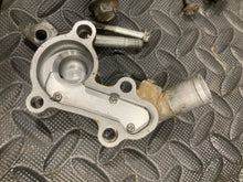 Load image into Gallery viewer, 2002-2025 Suzuki RM85 RM 85 85L misc hardware bolts water pump cover misc  OEM
