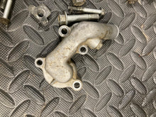 Load image into Gallery viewer, 2002-2025 Suzuki RM85 RM 85 85L misc hardware bolts water pump cover misc  OEM
